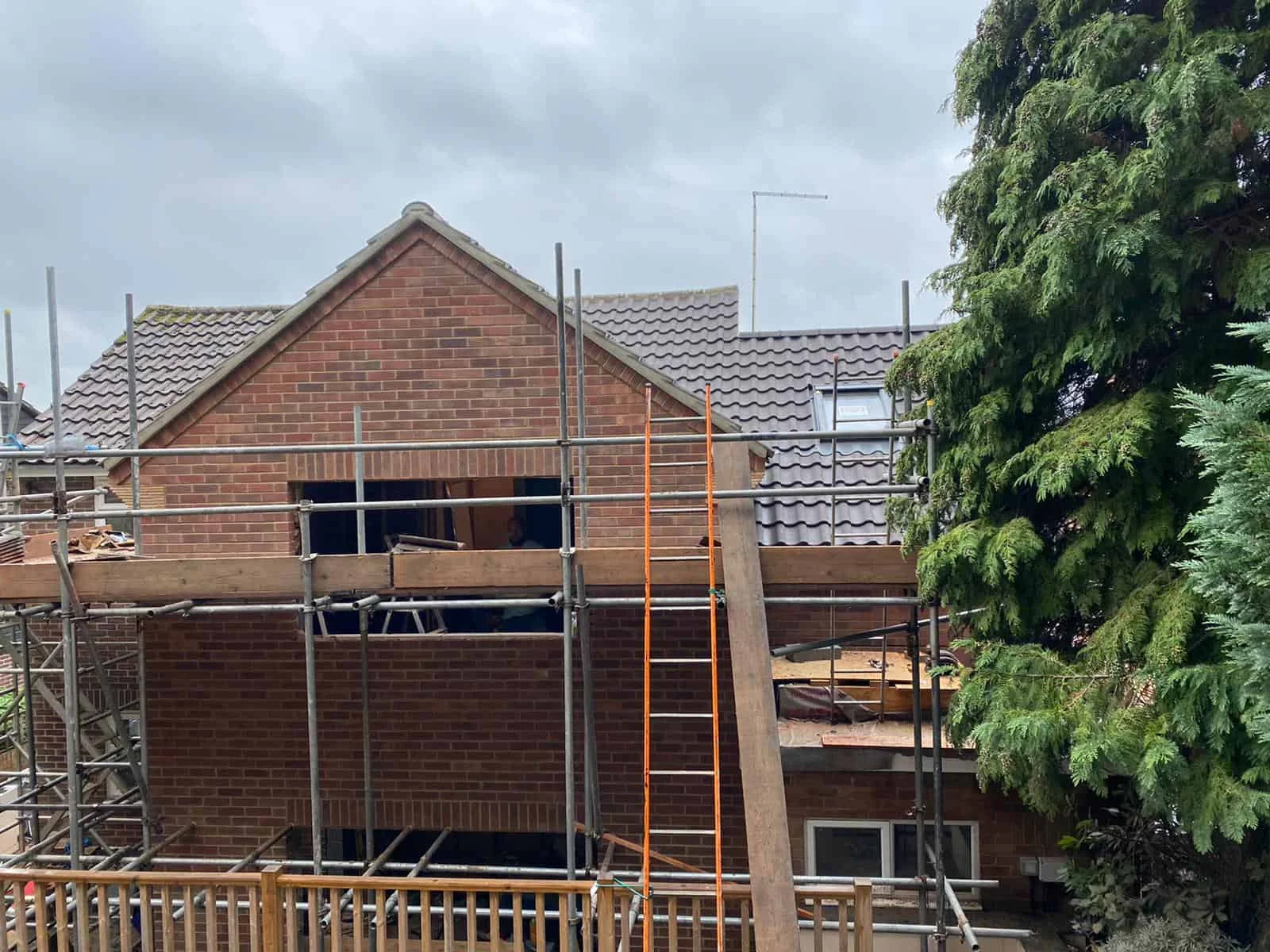 Brick house under construction in Surrey