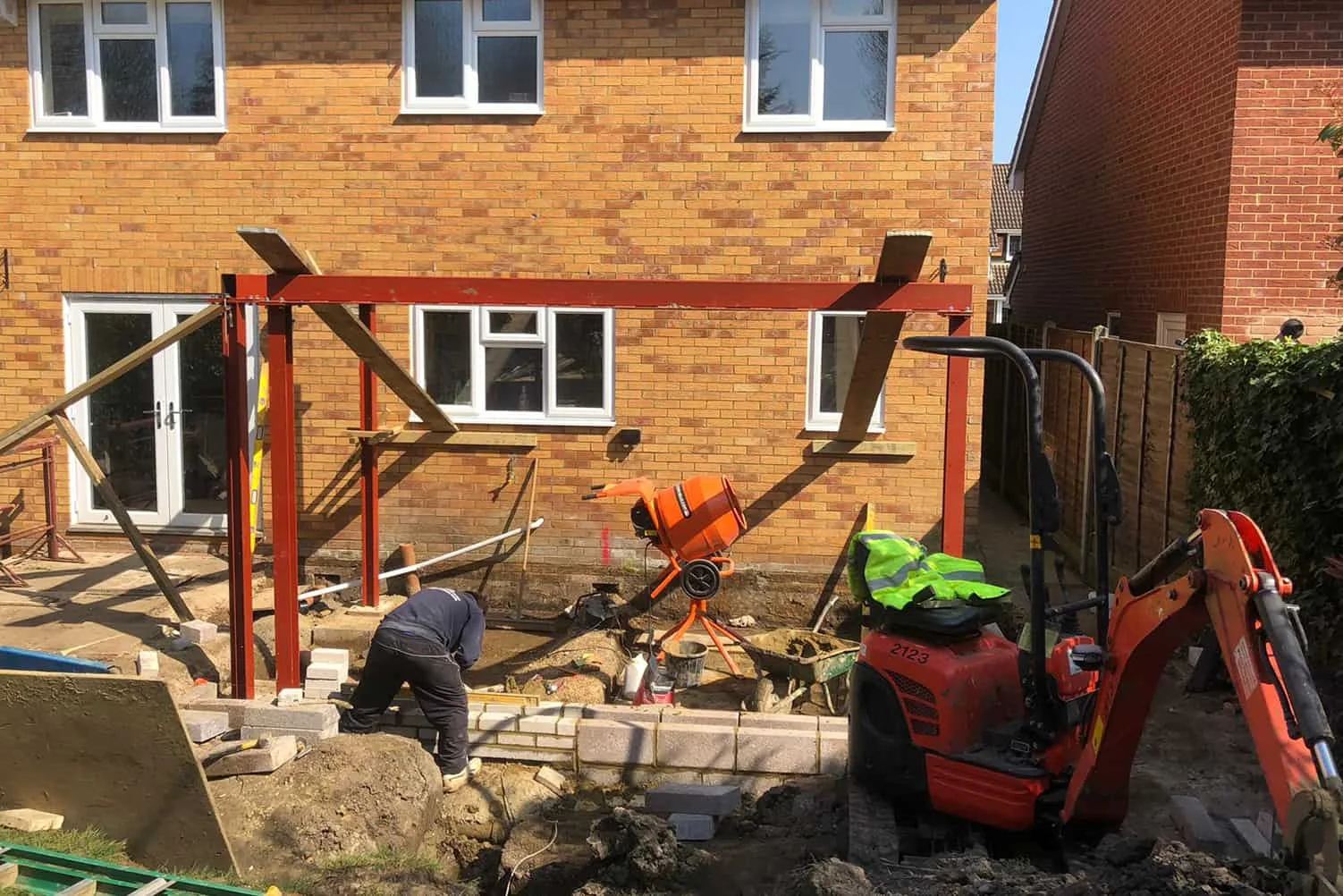 Structural steel installation with excavator support by A Jones Contractors