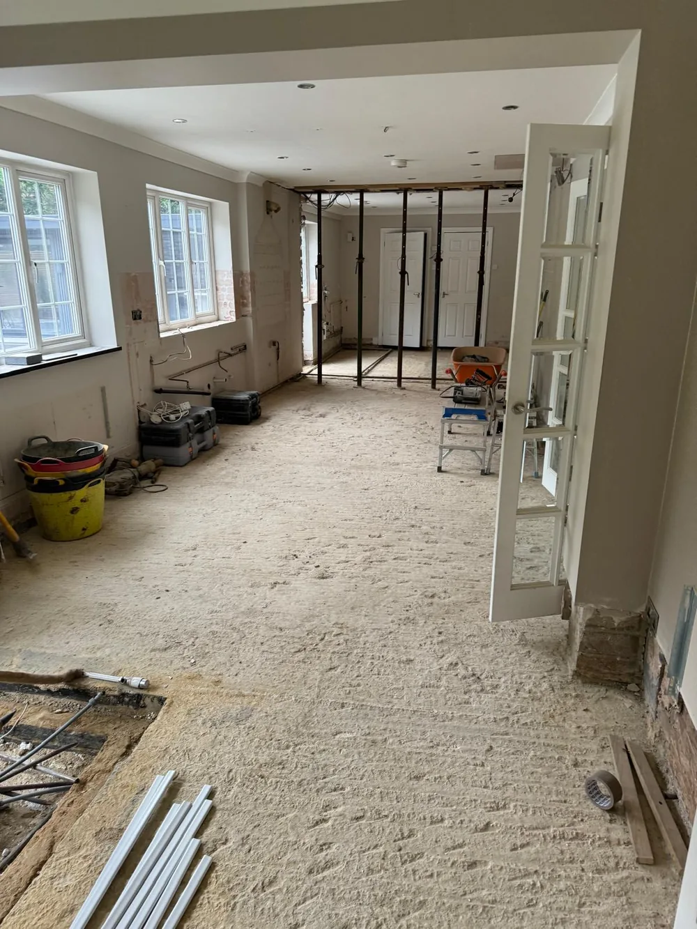 Temporary props supporting a structural opening during renovation work